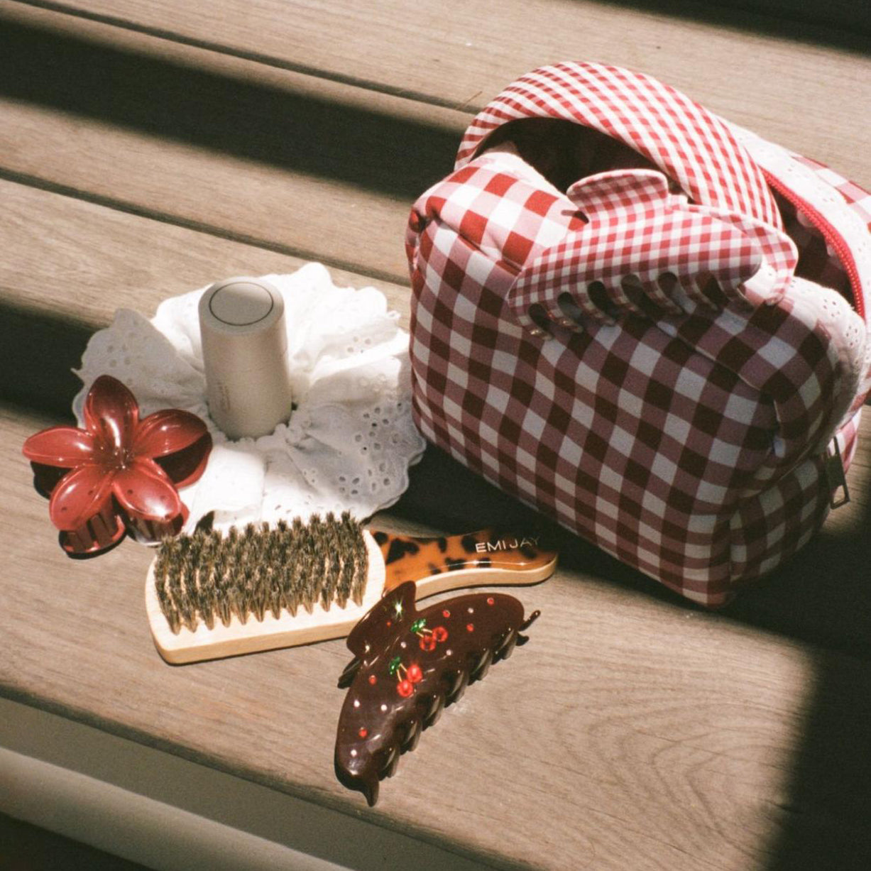 assorted emi jay hair care, styling tools, and accessories