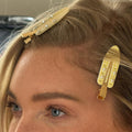 closeup of elsa hosk wearing Popstar Creaseless Makeup Hair Clips in Italian Ice and Panna Cotta