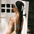 model wearing headband and Big Effing Clip in Navy Gingham